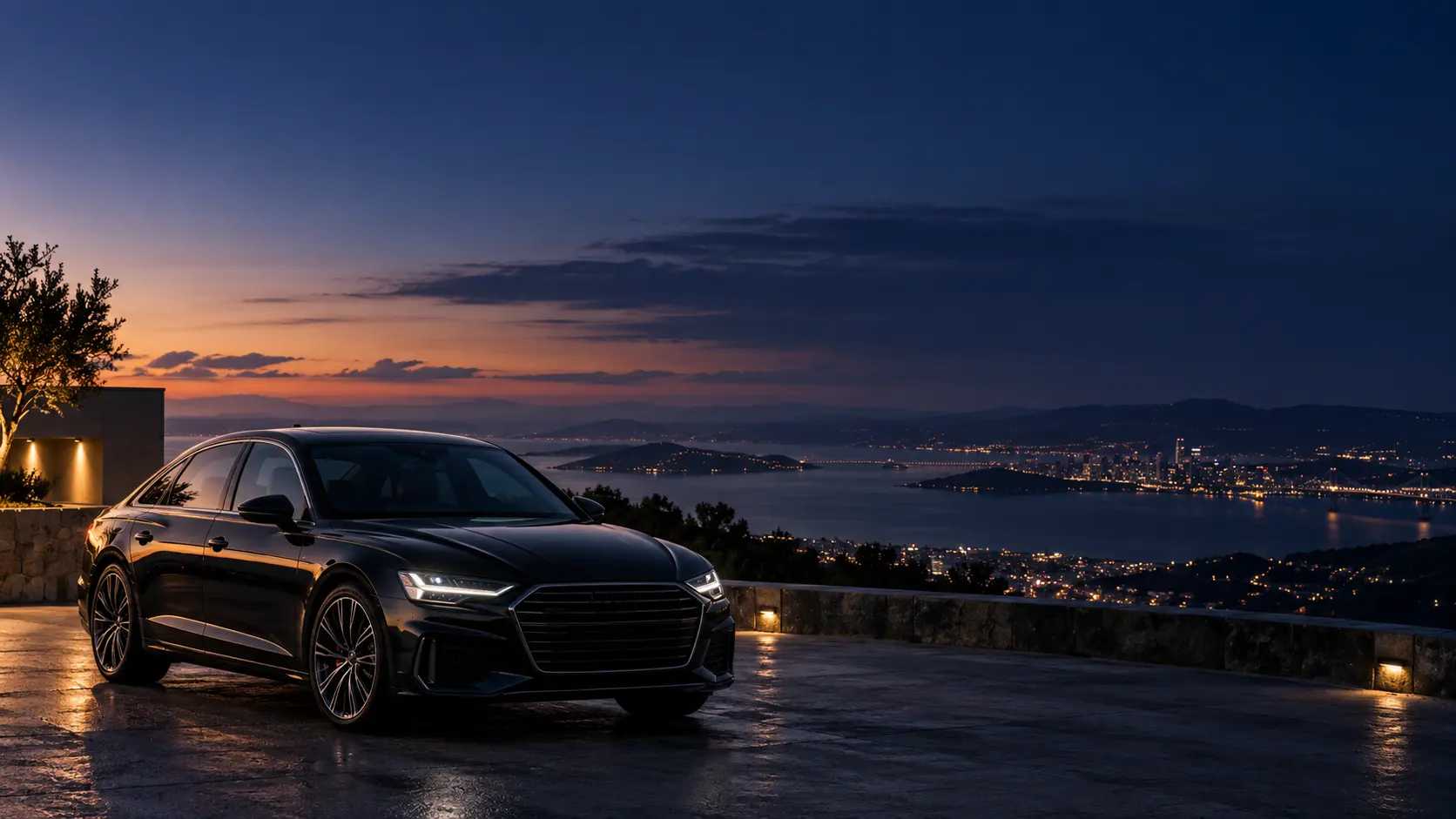 Automóvel em um mirante durante o anoitecer.